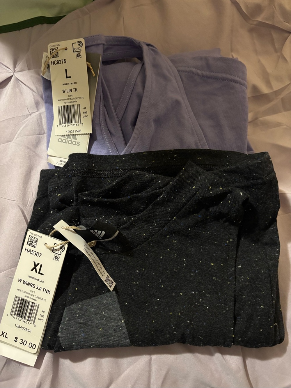 Adidas women’s tank tops. Purple size lrg & black speckled is size xl. NWT